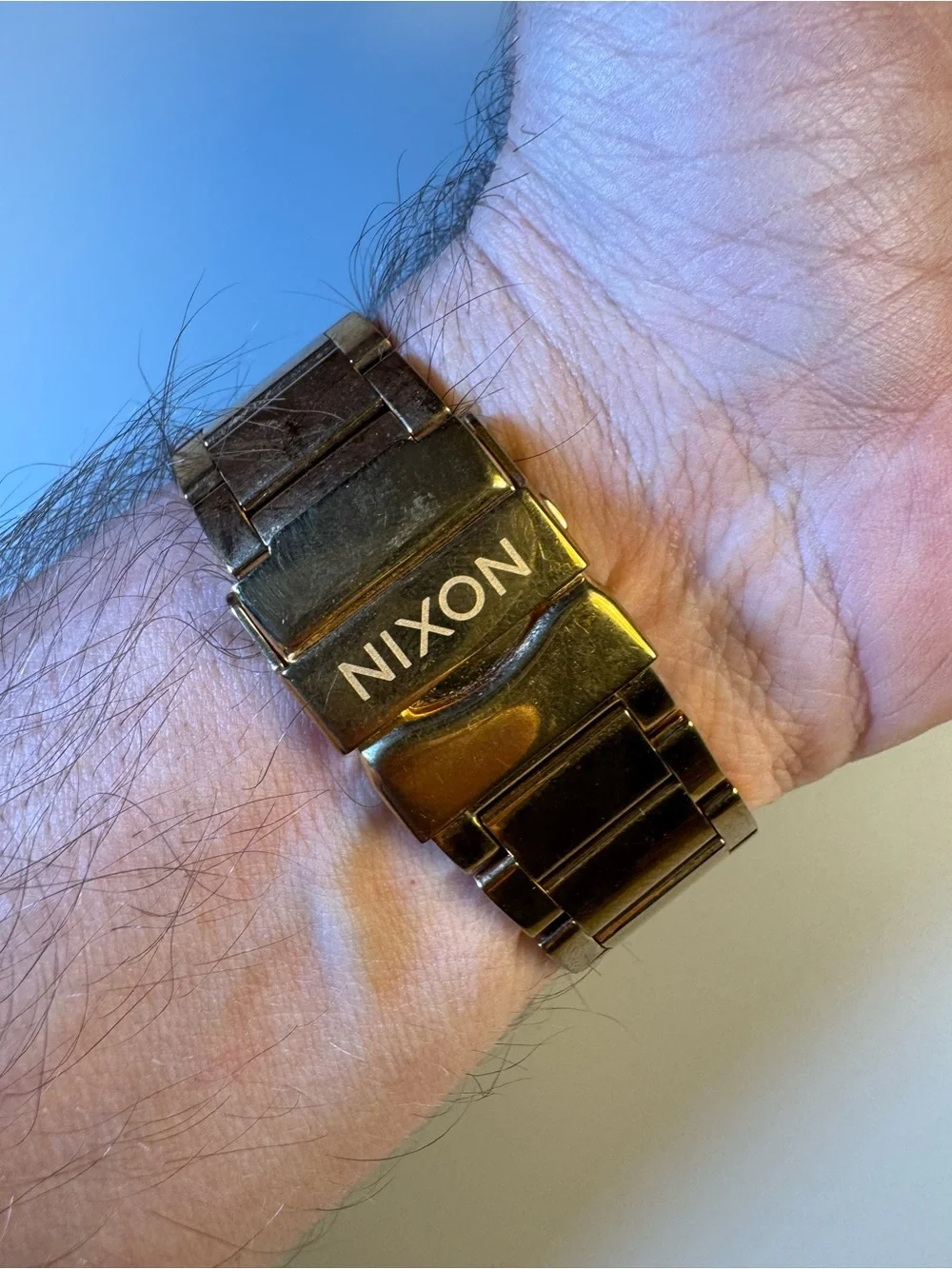 Nixon “High Maintenance” The Camden gold-tone watch w/ real diamond marker.